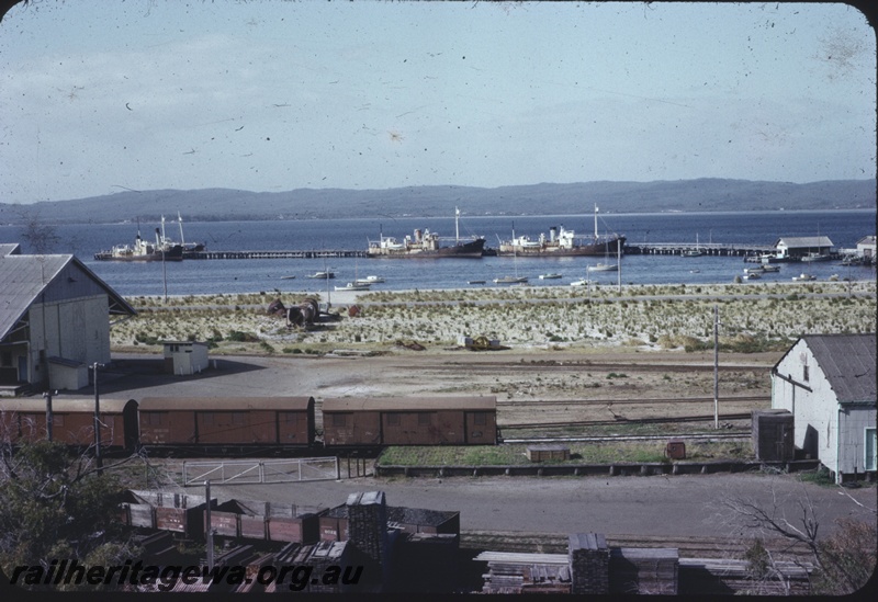 T04356
Whalers at Albany harbour, railway yard in foreground, partial view of sheds, assorted goods wagons, GSR line
