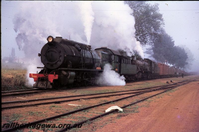 T04457
S class 550 steam locomotive with an unidentified W class steam locomotive hauling a goods train on the PP line.
