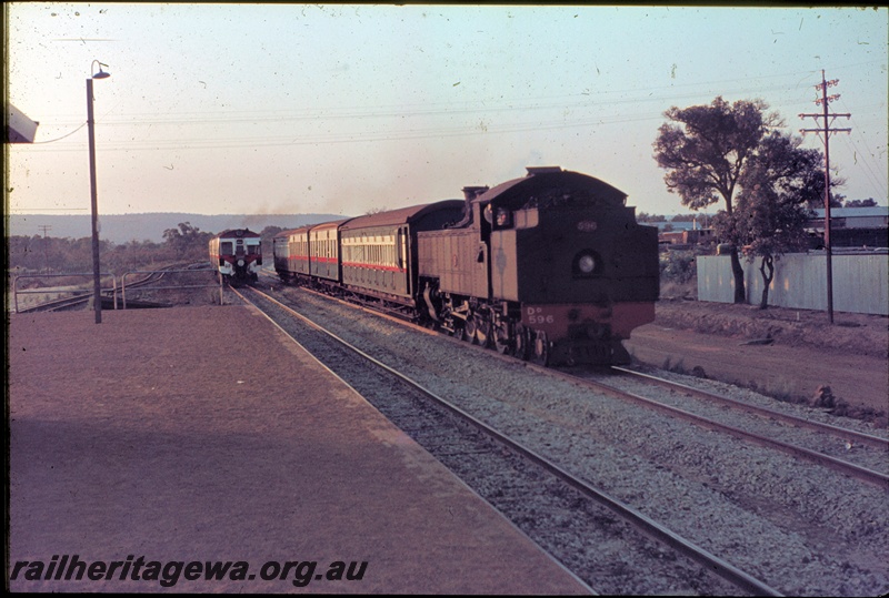 T04486
An unidentified ADG class railcar set crossing a steam hauled suburban passenger service at Armadale, SWR line
