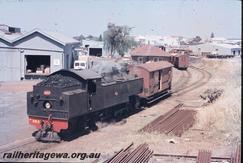 T04490
DM class 583 steam locomotive performing shunting duties, goods shed, Subiaco, ER line. End and side view of the loco.
