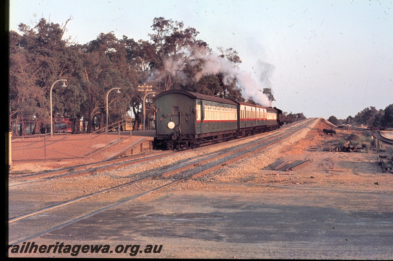 T04579
An unidentified steam locomotive hauling a Perth bound suburban passenger at Kenwick, SWR line
