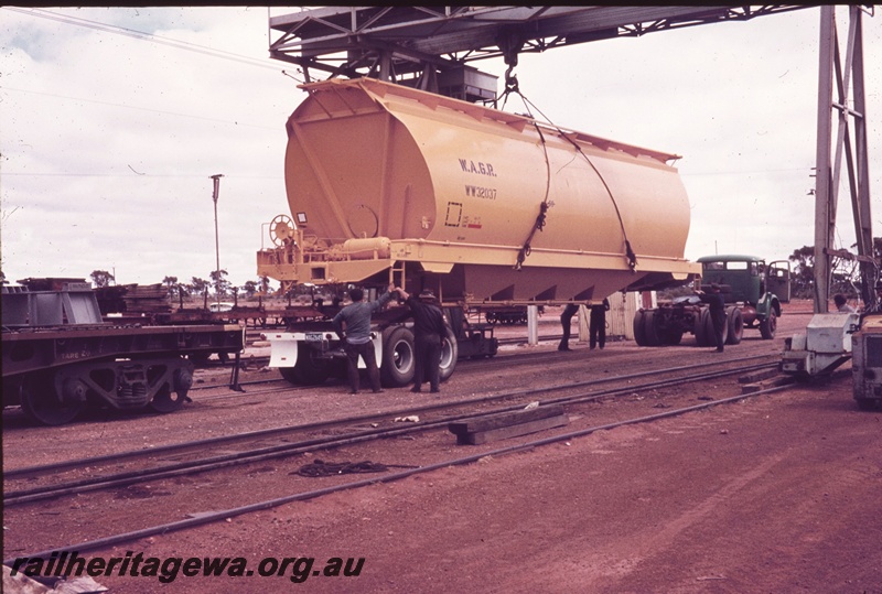 T04619
WW class 32037 wheat hopper being transferred at Parkeston from rail to road. These units were road hauled to West Merredin for subsequent transfer to rail and forwarding to Midland.
