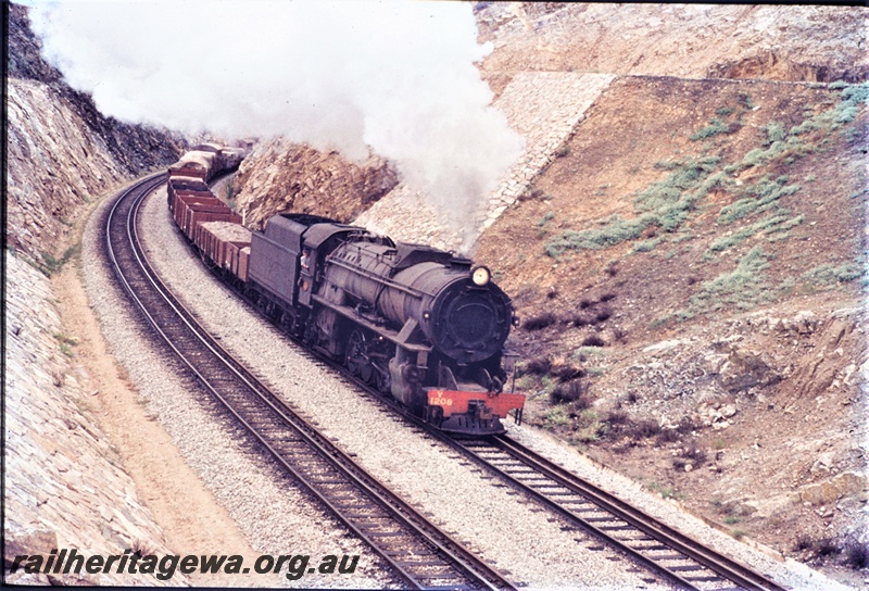 T04633
V class 1208 steam locomotive with a goods train travelling through Windmill Hill cutting in the Avon Valley.
