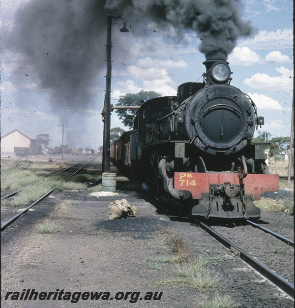 T04642
PM class 714 steam locomotive departing an Unknown location with a goods train.
