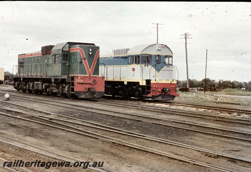 T04679
A class 1512 narrow gauge and J class standard gauge diesel locomotives pictured at Midland Workshops.
