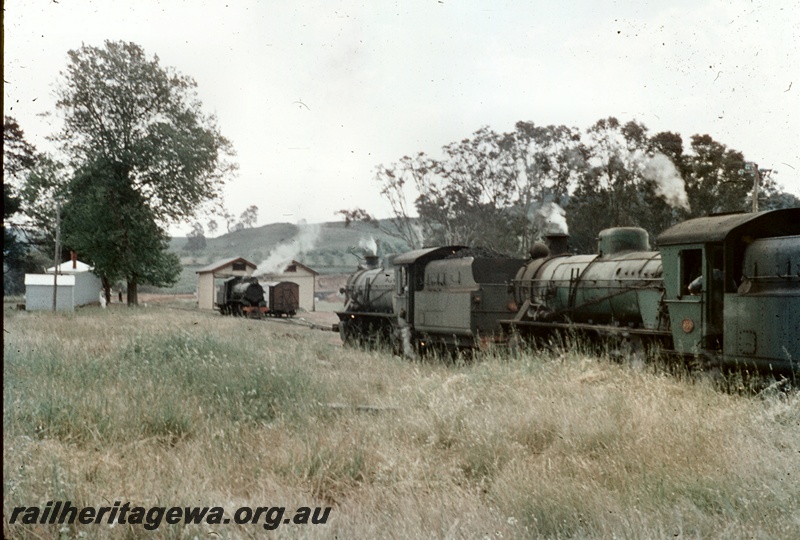 T04701
Two W class steam locomotives, with another W class in the background, at an unidentified lower South West station.
