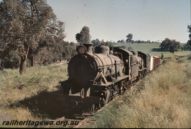 T04702
Two W class steam locomotives hauling a goods train in the lower South West.
