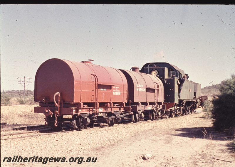 T04736
UT class 664 steam locomotive with 2 JA class water tankers at Watheroo. 
