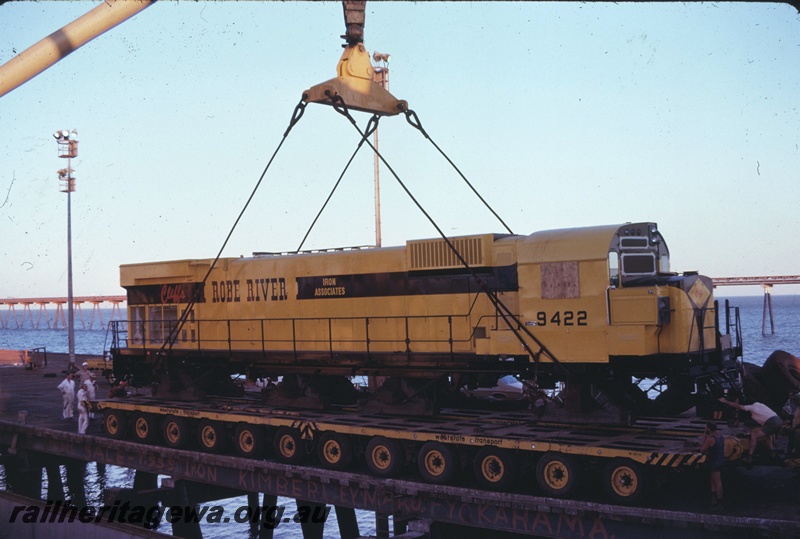 T04742
Cliffs Robe River (CRRIA) M636 class 9422 being off loaded from ship at Cape Lambert wharf. 
