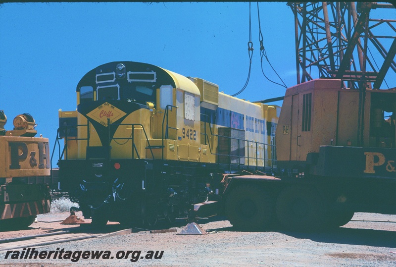 T04744
Cliffs Robe River (CRRIA) new locomotive M636 class 9422 being placed on bogies at Cape Lambert wharf.
