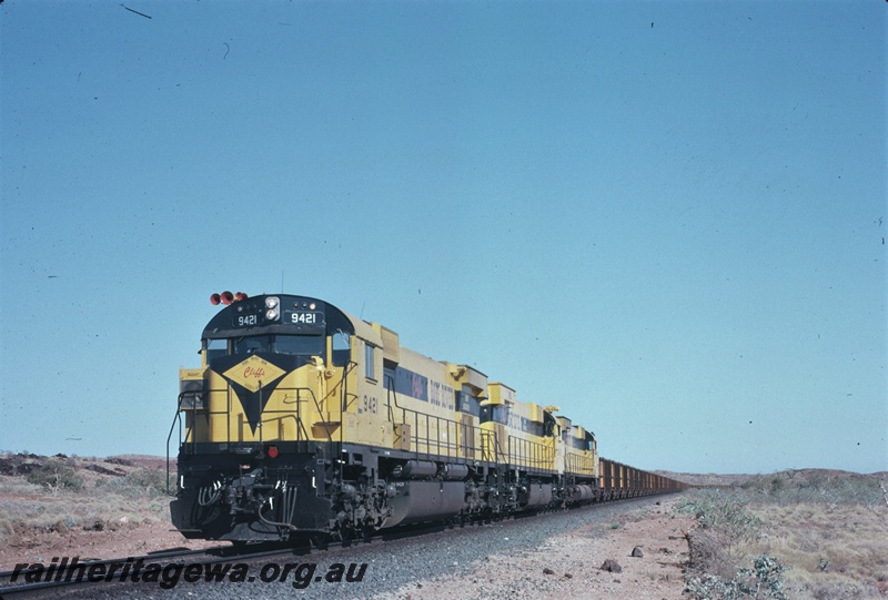 T04746
Cliffs Robe River (CRRIA) M636 class 9421 on first trial leading triple headed empty ore train to Pannawonica. 
