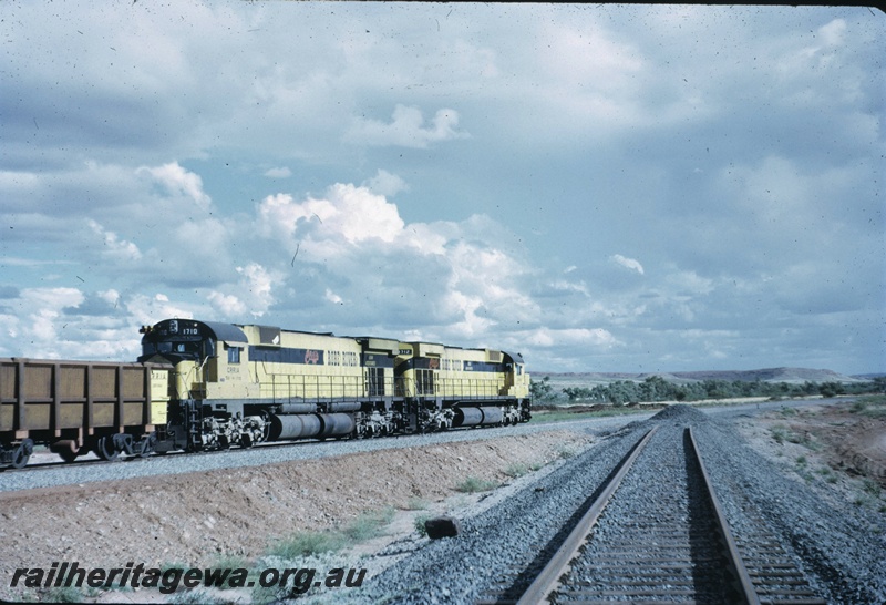 T04751
Cliffs Rob River (CRRIA) M636 class 9414 and M636 class 9410 haul an empty ore train to Pannawonica over the Western Creek deviation 
