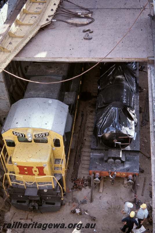 T04765
Hamersley Iron (HI) GE36-7 class 5057 (Goninan-GE) in the hold of vessel MV Iron Baron prior to being lifted onto wharf at Dampier.
