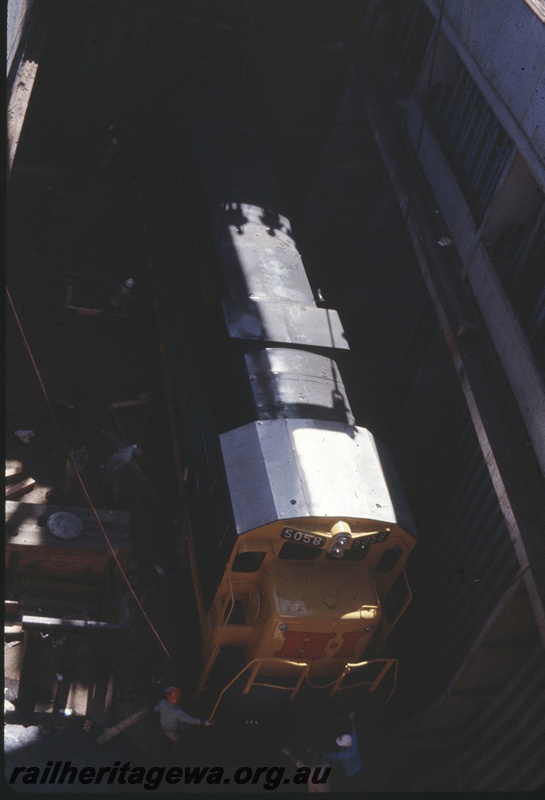 T04771
Hamersley Iron (HI) GE36-7 class 5058 (Goninan-GE) in hold of vessel MV Iron Baron prior to being lifted onto wharf at Dampier.
