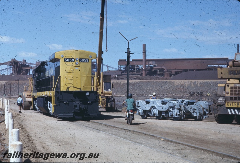 T04781
Hamersley Iron (HI) GE36-7 class 5059 on wharf at Dampier (long end view). 

