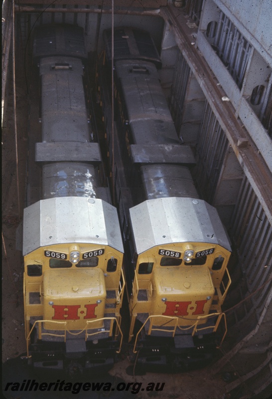 T04782
Hamersley Iron (HI) GE36-7 class 5058 and 5059 in hold of vessel MV Iron Baron prior to being lifted onto wharf at Dampier.
