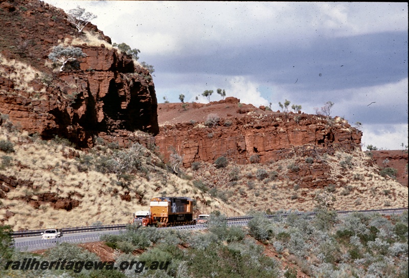 T04826
Goldsworthy Mining (GML) GML10 class on delivery road trip to Port Hedland, Great Northern Hwy near Newman.
