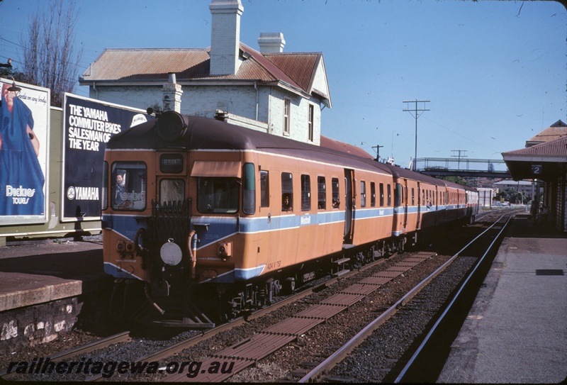 T04967
Four car DMU set bound for Fremantle, led by ADA/V class 752, station buildings, platforms, pedestrian overpass, Claremont, ER line, second last day before closure of Fremantle line
