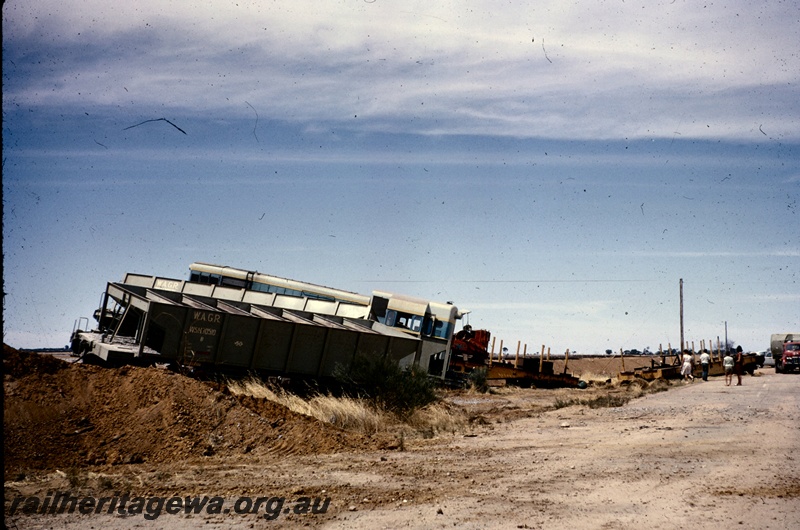 T05054
Derailment of runaway ballast train, vehicles off track include WSH class 30510, flat wagons and diesel loco, workers, spectators, Doodlakine, EGR line
