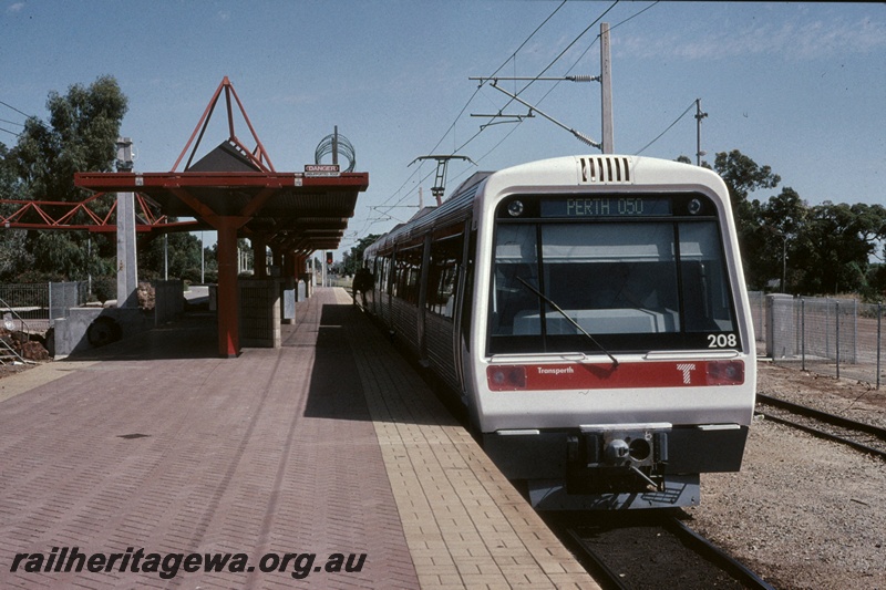 T05200
Transperth EMU,  AEA class 208 with the red stripe above the windows, Armadale, SWR line., front on view
