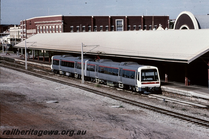 T05201
Transperth AEA class 210 and AEB class electric railcars, with the red stripe above the windows, Fremantle Station, ER line. 
