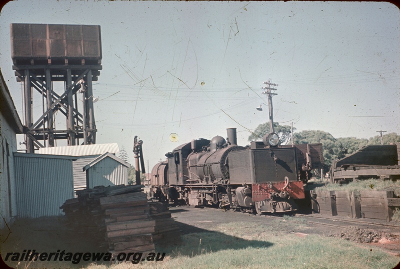 T05228
MSA class 497, water tower, water column, sleeper pile, trackside buildings, wagon (part only), Busselton loco depot, BB line, side and front view
