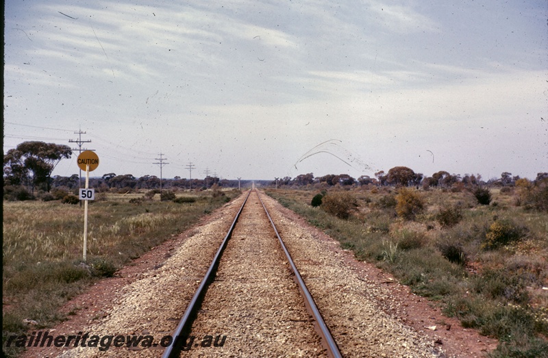 T05235
Track, caution sign, level crossing, Parkeston, TAR line, view looking east
