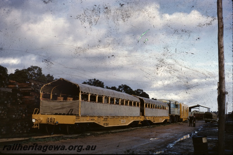 T05261
Inspection train comprising standard gauge diesel, yellow van, and WF class 30047 and WF class 30046 wagons, large pile of sleepers, Upper Swan, Avon Valley line
