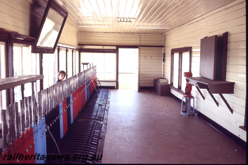 T05314
Signal box restoration, interior view, track diagram, levers, frame, electric staff instrument, desk, onlooker, Merredin, EGR line, view towards door
