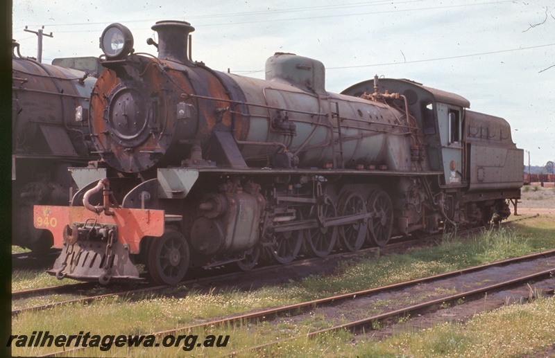 T05329
W class 940, on scrap road, Collie, BN line, front and side view
