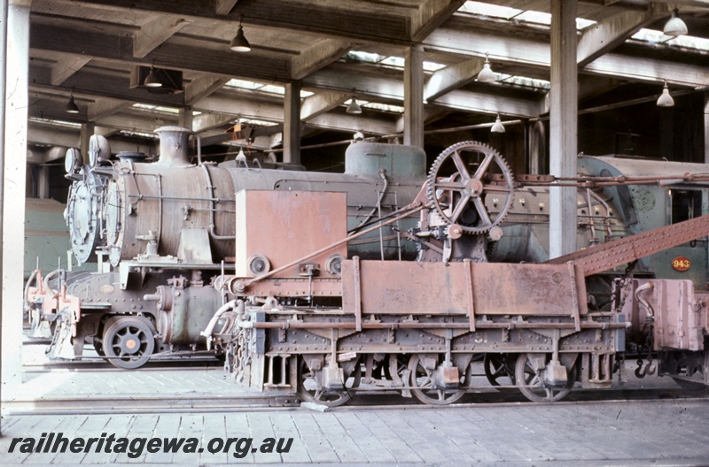 T05350
W class 493, another W class loco, hand crane 31, wooden beams, roof, inside Collie roundhouse, BN line, side views
