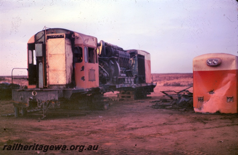 T05364
Goldsworthy Mining loco GML 3, scrapped, in parts, end and side view
