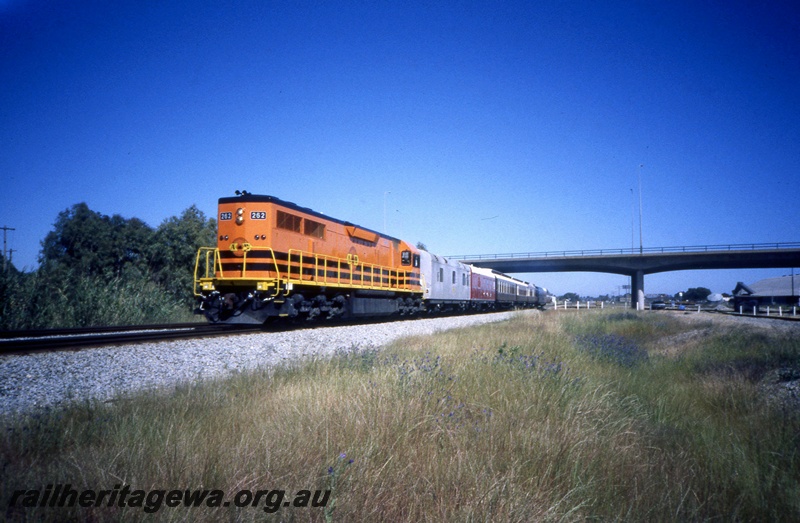 T05390
L class 262, on Federation train test run, passing under road overpass, ER line, front and side view
