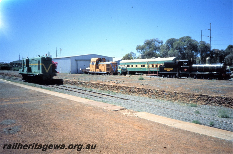 T05419
Y class 1108 in green and yellow livery, B class 1610 in Westrail orange with blue and white stripe, G class 233 