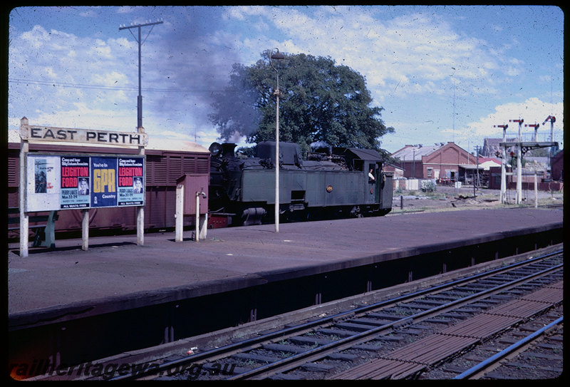 T06020
UT Class 664 on Up goods train through East Perth Station, station sign, semaphore bracket signal, SWR line
