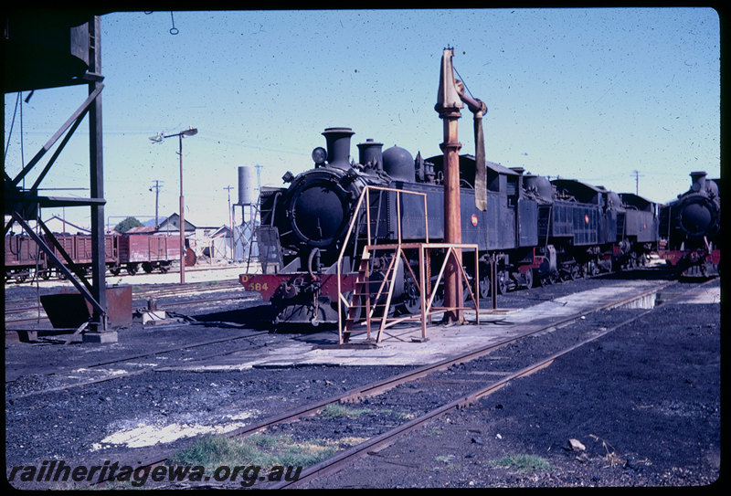 T06043
DM Class 584 and DM Class 587 with other DD Class and DM Class steam locos stabled at Midland loco depot, coaling tower, M Class coalboxes, GER Class open wagon
