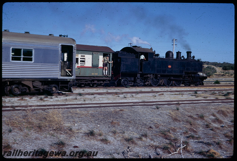 T06077
ADB/ADK Class railcar on ARHS tour train, crossing DD Class 592 on ARHS 