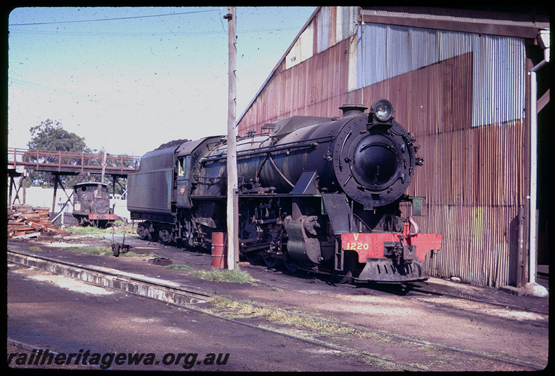 T06113
V Class 1220, Bunbury roundhouse, H Class 18 stowed derelict in background, ash pit, footbridge
