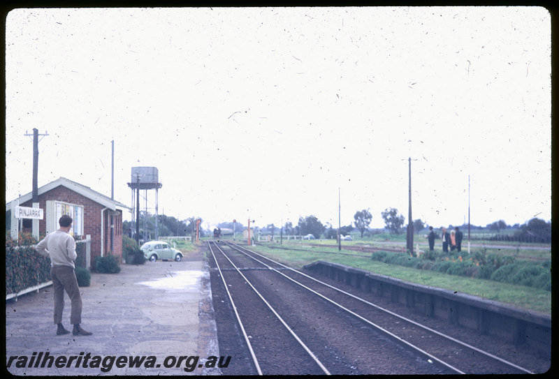 T06179
DM Class 587 and DD Class 592, ARHS tour train to Coolup, approaching Pinjarra, station sign, platform, toilet block, water tower, SWR line
