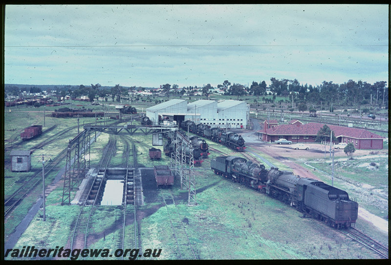 T06203
Collie loco depot, stored steam locomotives, ash pit, gantry crane, roundhouse, office, photo taken from water tower, BN line
