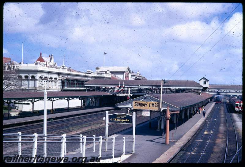 T06408
Overall photo of City Station from Barrack Street Bridge, Perth, station building, platforms, water column, semaphore bracket signal, railcars, footbridge
