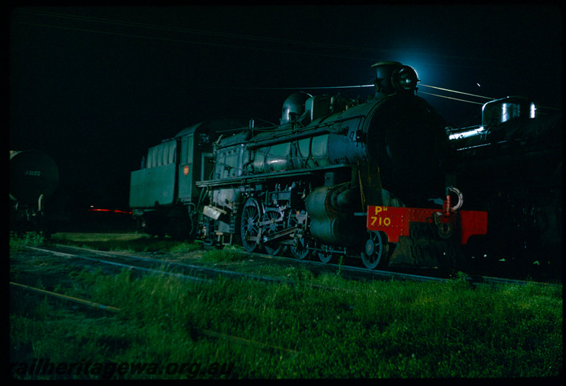 T06439
PM Class 710, stabled, Collie, J Class 1157 tank wagon, night photo
