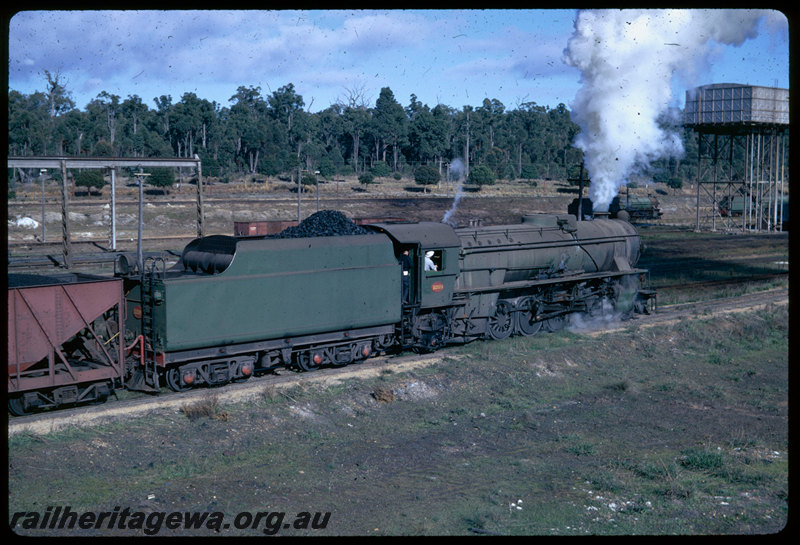 T06483
V Class 1203, loaded coal train departing Collie, XA Class coal wagon, water tank, BN Line
