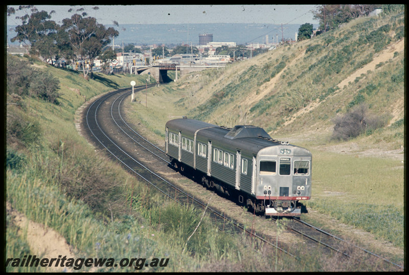 T06782
ADK Class 681 railcar with ADB Class trailer, Up suburban passenger service, West Leederville Bank, Thomas Street overpass in background, searchlight signals, ER line
