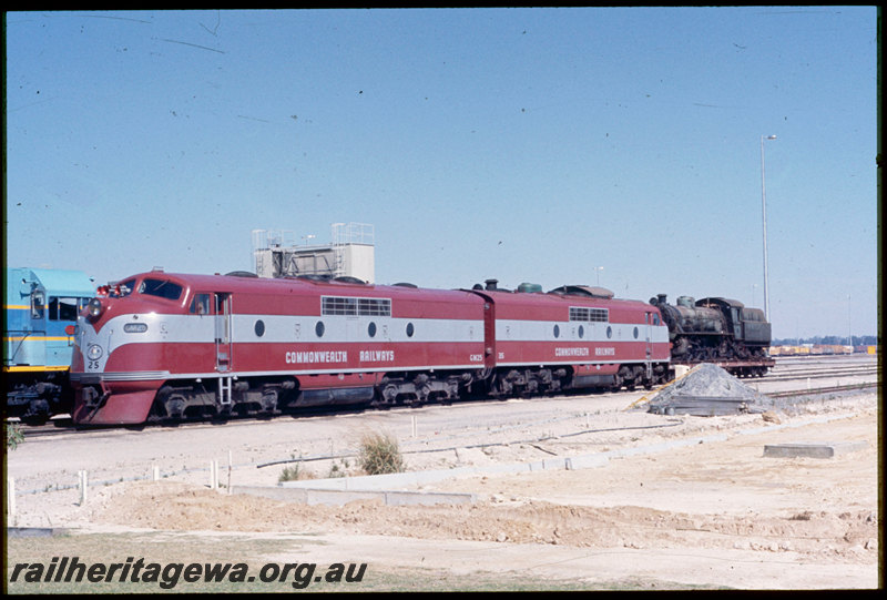 T06819
Commonwealth Railways GM Class 35, GM Class 25, L Class 275 and L Class 258 with W Class 933 and W Class 934 steam locomotives loaded on Commonwealth Railways QB Class 2407 and QB Class 2406 12-wheel flat wagons bound for Port Augusta, Forrestfield
