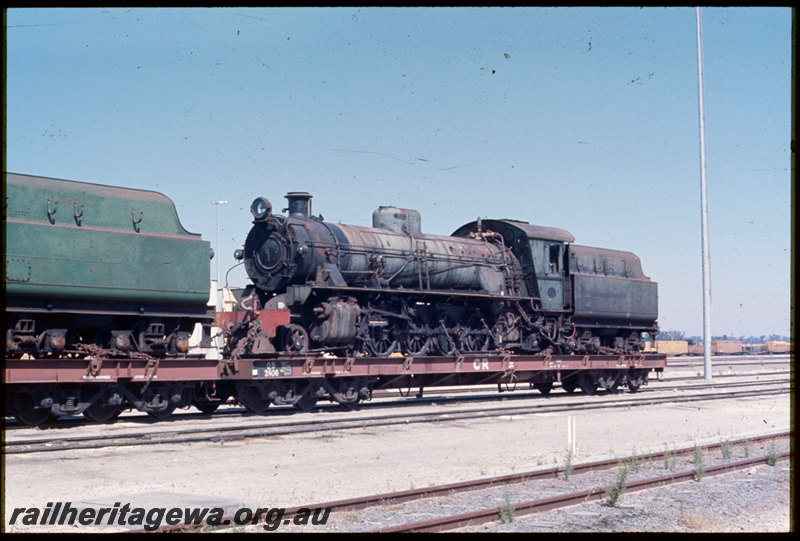 T06822
W Class 934 and W Class 933 steam locomotives loaded on Commonwealth Railways QB Class 2406 and QB Class 2407 12-wheel flat wagons bound for Port Augusta, Forrestfield
