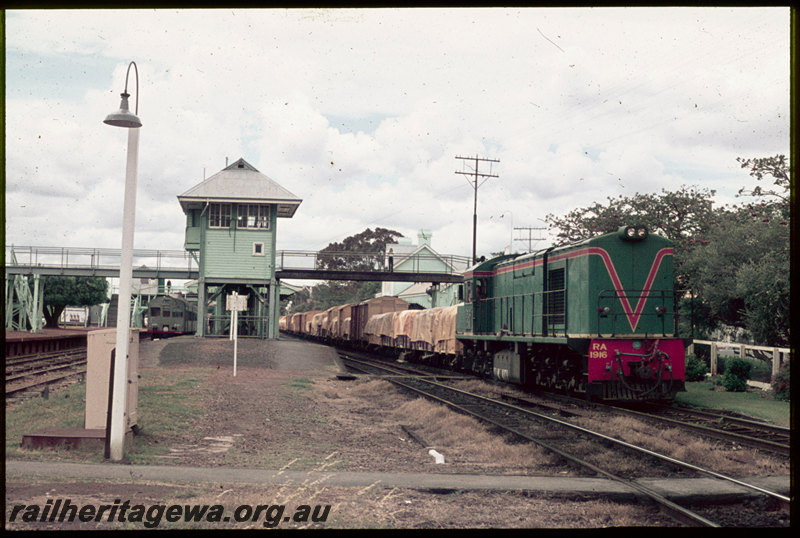 T06838
RA Class 1916, Up goods train, ADK/ADB Class railcar at platform, Claremont, signal cabin, pedestrian crossing, footbridge, station building, ER line
