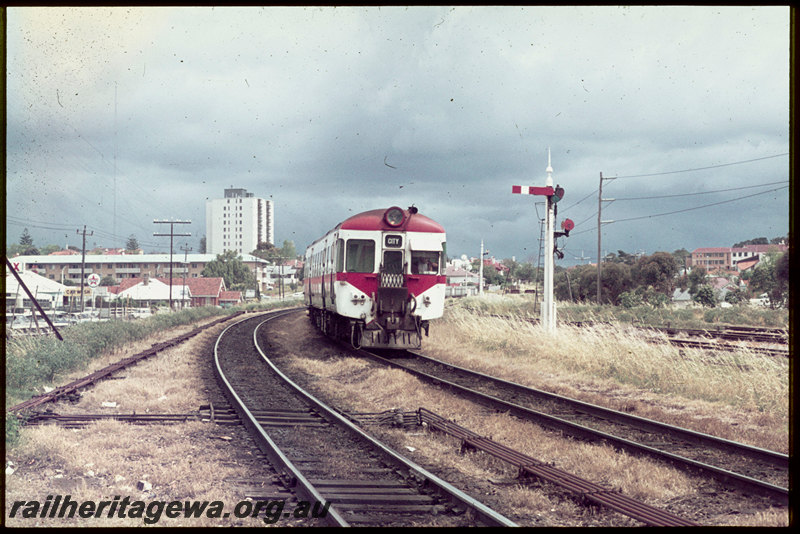 T06839
ADX Class railcar, Down suburban passenger service, arriving at Claremont, semaphore signal, shunt dolly, point rodding, ER line
