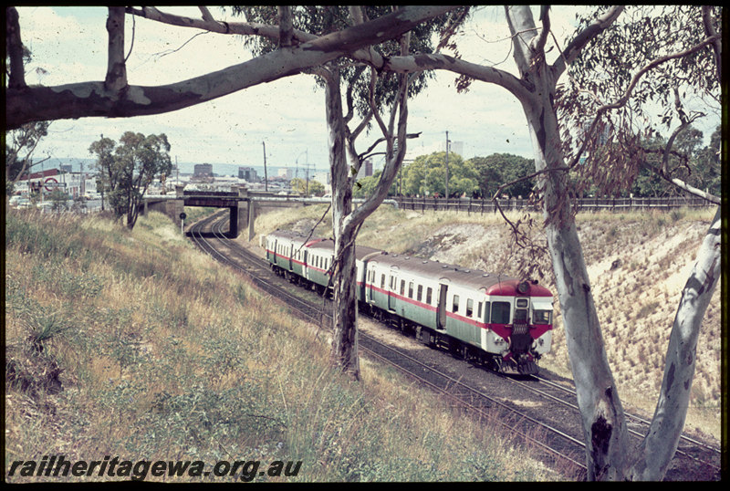 T06841
ADX/ADA/ADX Class railcar set, Up suburban passenger service, West Leederville Bank, Thomas Street overpass in background, ER line
