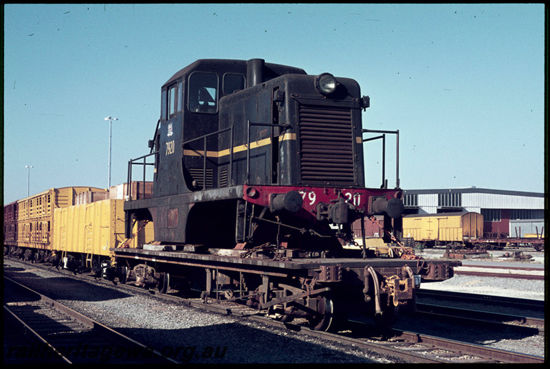 T06859
Ex-NSWGR 79 Class 7920, loaded on QCE Class 23594 flat wagon, Forrestfield, 79 Class bound for Geraldton to be shipped to British Phosphate Commissioners on Christmas Island

